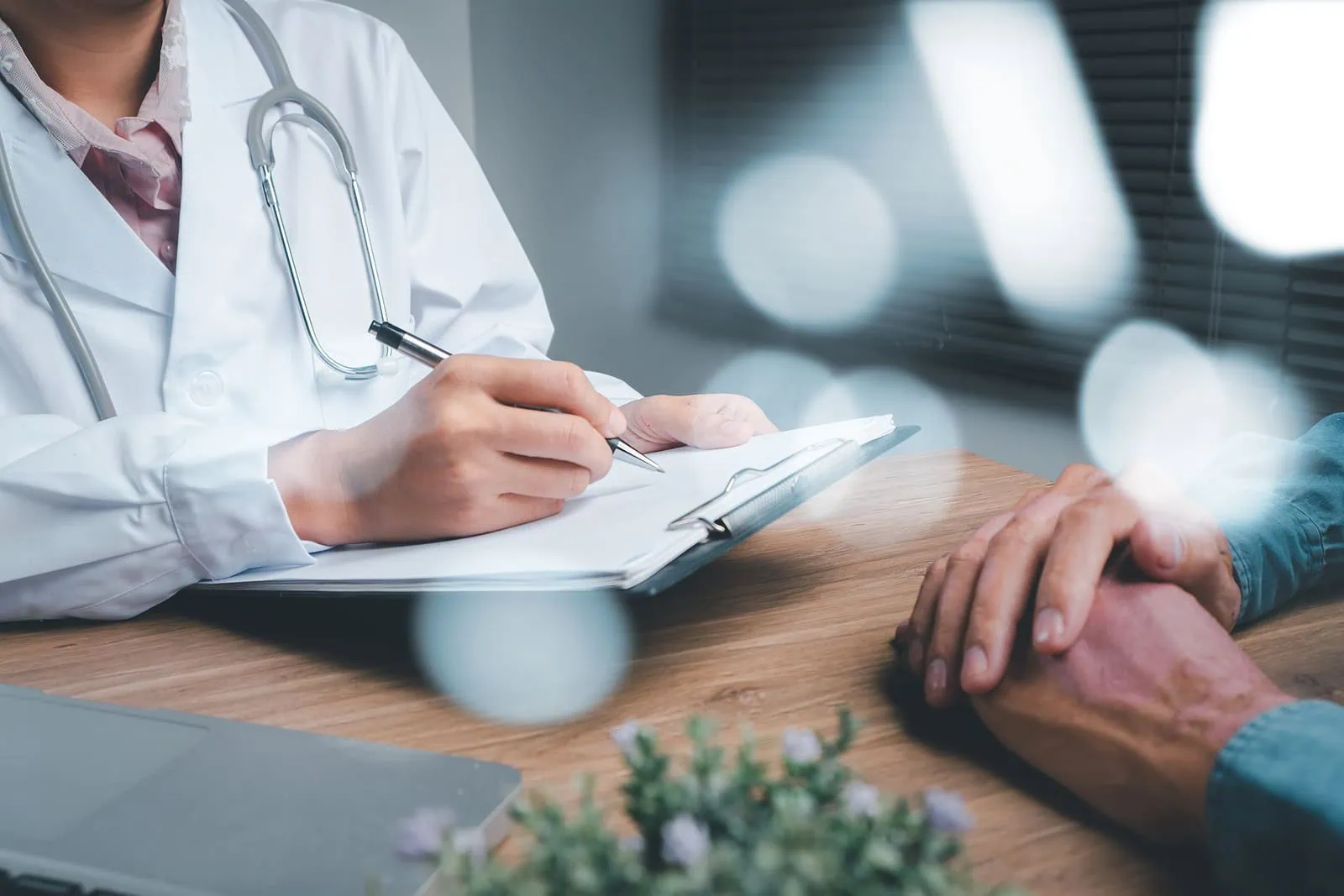 Patient discussing diagnosis with doctor.